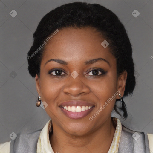 Joyful black young-adult female with long  black hair and brown eyes