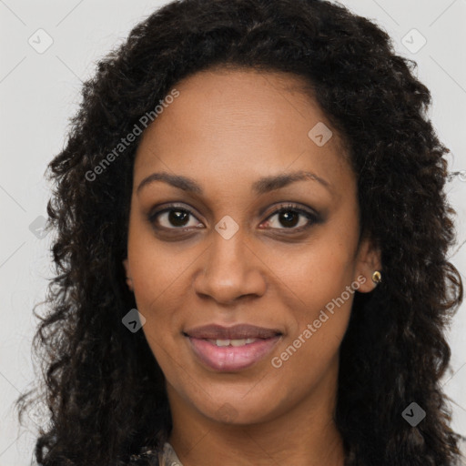 Joyful black young-adult female with long  brown hair and brown eyes