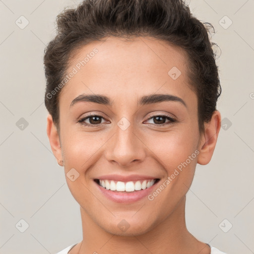 Joyful white young-adult female with short  brown hair and brown eyes