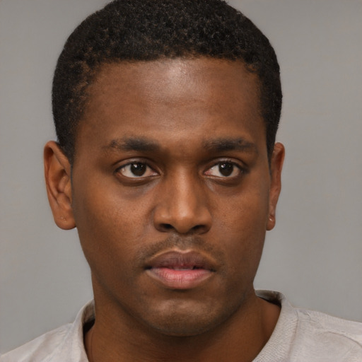 Neutral black young-adult male with short  brown hair and brown eyes
