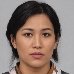 Neutral asian young-adult female with medium  black hair and brown eyes