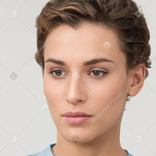 Neutral white young-adult female with short  brown hair and brown eyes