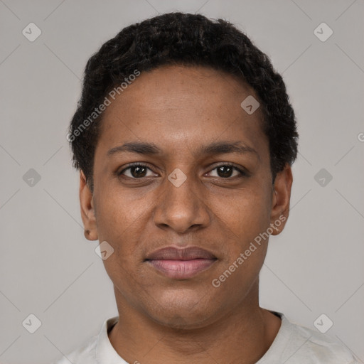 Joyful black young-adult male with short  black hair and brown eyes