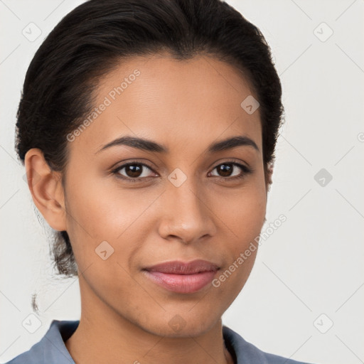 Joyful latino young-adult female with short  brown hair and brown eyes