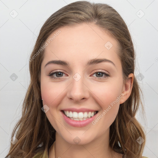 Joyful white young-adult female with long  brown hair and grey eyes