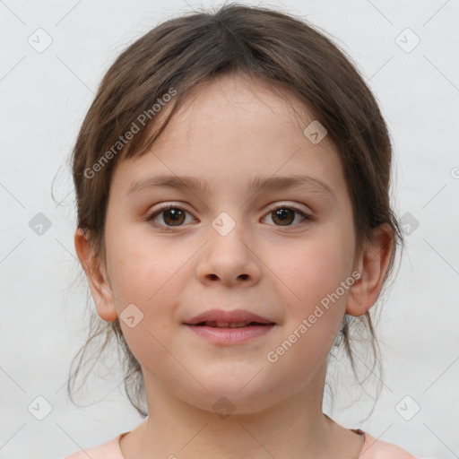 Joyful white child female with medium  brown hair and brown eyes