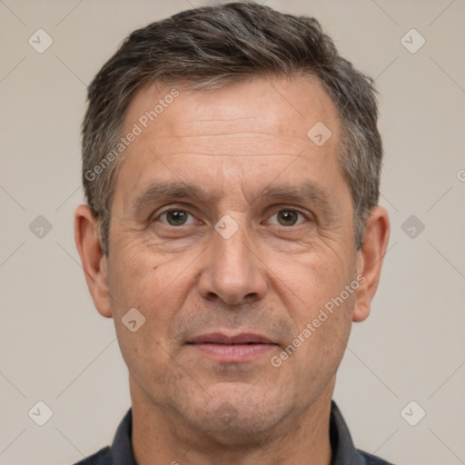 Joyful white middle-aged male with short  brown hair and brown eyes