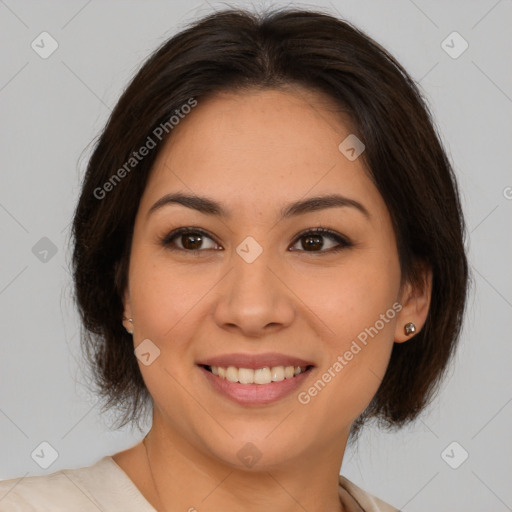 Joyful latino young-adult female with medium  brown hair and brown eyes