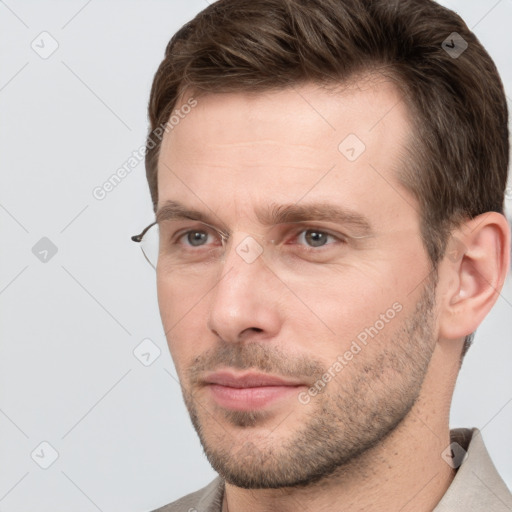 Neutral white young-adult male with short  brown hair and grey eyes