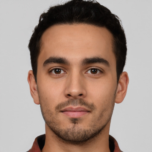 Neutral latino young-adult male with short  black hair and brown eyes