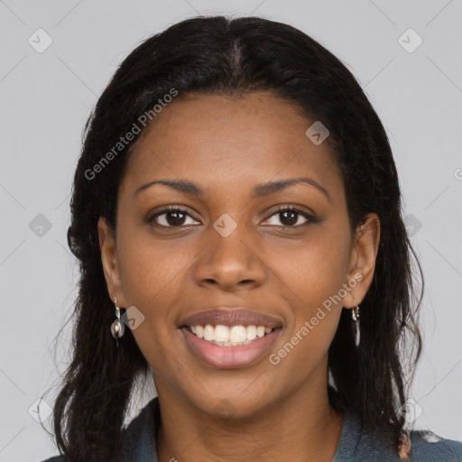 Joyful black young-adult female with medium  brown hair and brown eyes