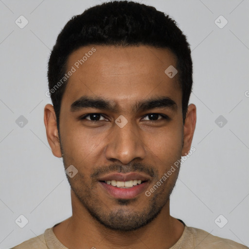Joyful latino young-adult male with short  black hair and brown eyes
