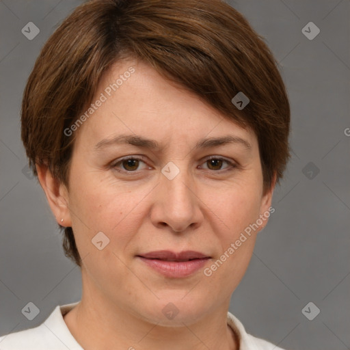 Joyful white adult female with short  brown hair and brown eyes