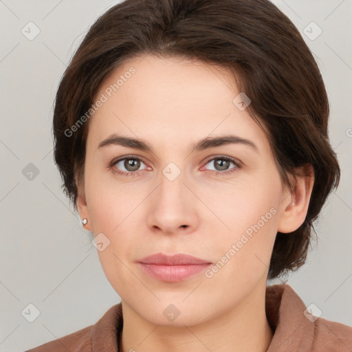 Neutral white young-adult female with medium  brown hair and brown eyes