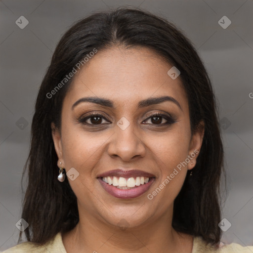 Joyful latino young-adult female with long  brown hair and brown eyes