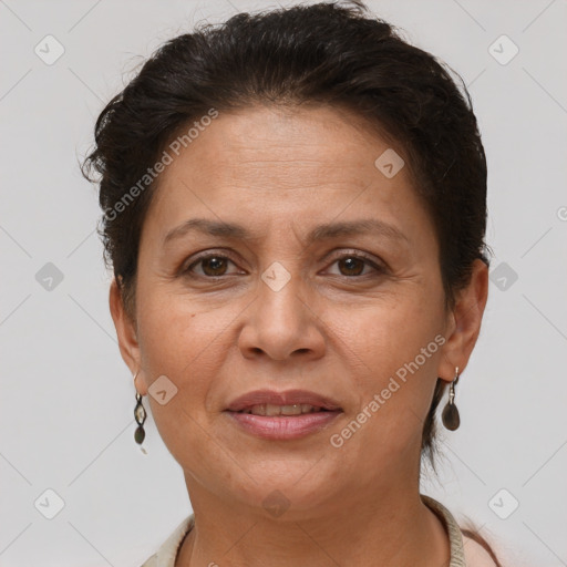 Joyful white adult female with short  brown hair and brown eyes