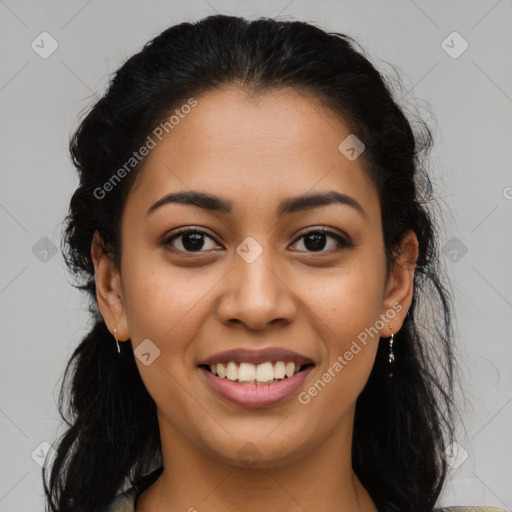 Joyful latino young-adult female with long  brown hair and brown eyes