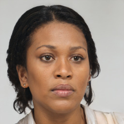 Neutral black adult female with short  brown hair and brown eyes