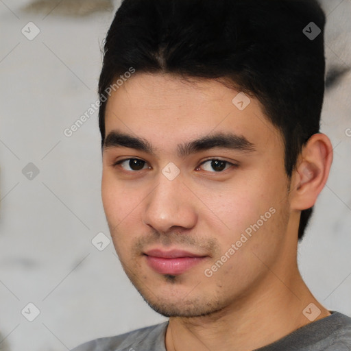 Neutral white young-adult male with short  black hair and brown eyes