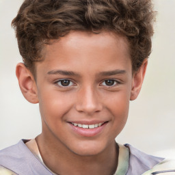 Joyful white child male with short  brown hair and brown eyes