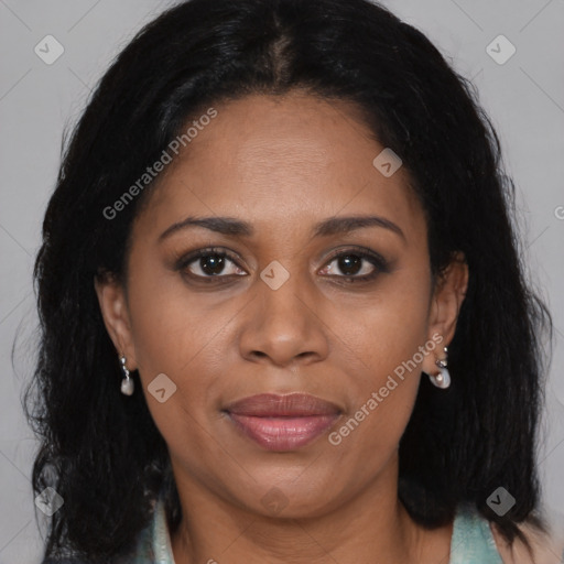 Joyful black adult female with medium  brown hair and brown eyes