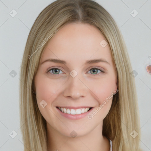 Joyful white young-adult female with long  brown hair and blue eyes