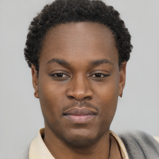 Neutral black young-adult male with short  brown hair and brown eyes