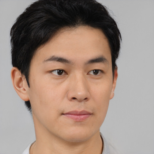 Neutral asian young-adult male with short  brown hair and brown eyes