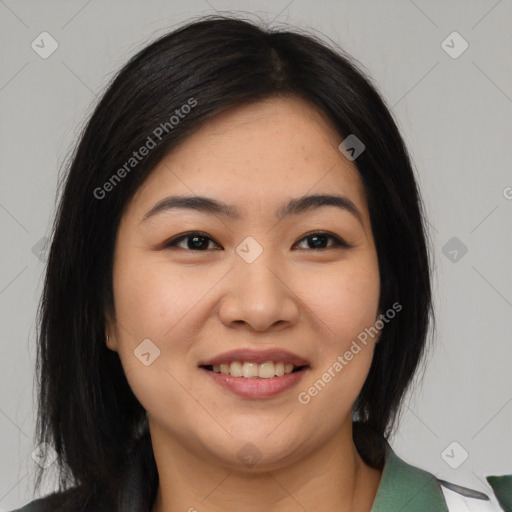 Joyful asian young-adult female with medium  black hair and brown eyes
