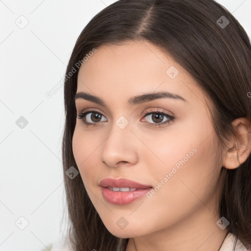 Neutral white young-adult female with long  brown hair and brown eyes