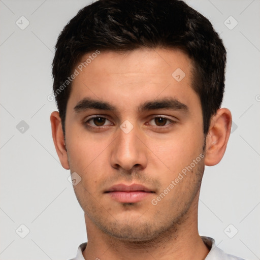 Neutral white young-adult male with short  brown hair and brown eyes