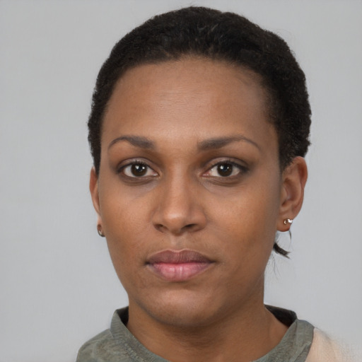 Neutral black young-adult female with short  black hair and brown eyes