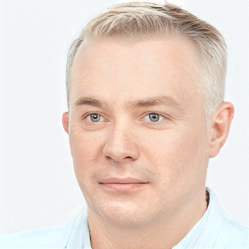 Joyful white adult male with short  brown hair and grey eyes