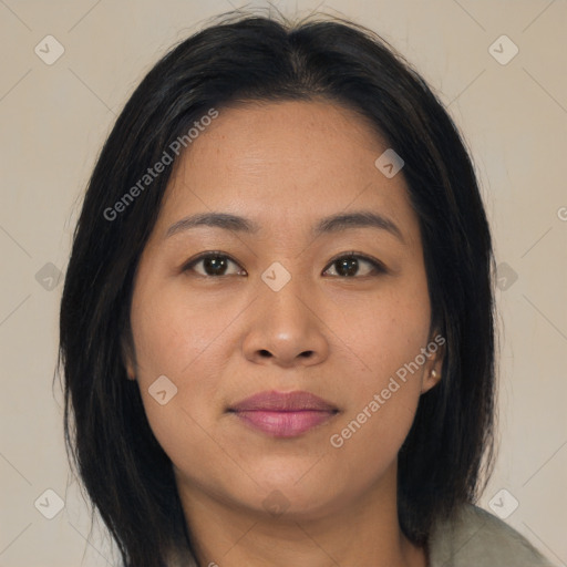 Joyful asian young-adult female with medium  brown hair and brown eyes