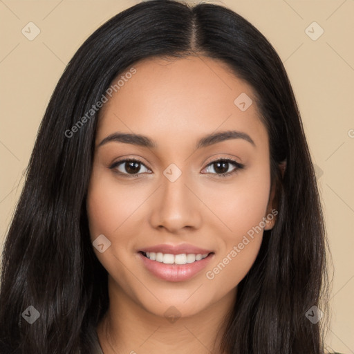 Joyful latino young-adult female with long  black hair and brown eyes