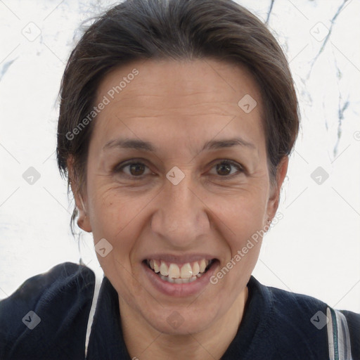 Joyful white adult female with short  brown hair and brown eyes