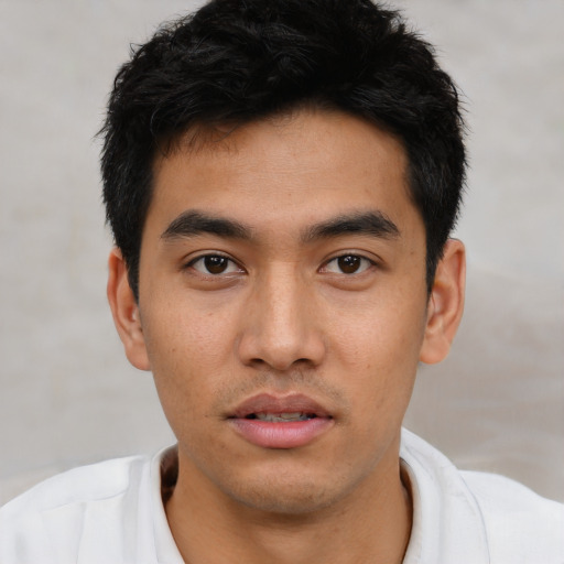 Neutral asian young-adult male with short  black hair and brown eyes