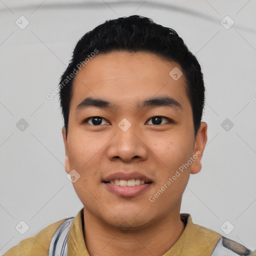 Joyful asian young-adult male with short  black hair and brown eyes