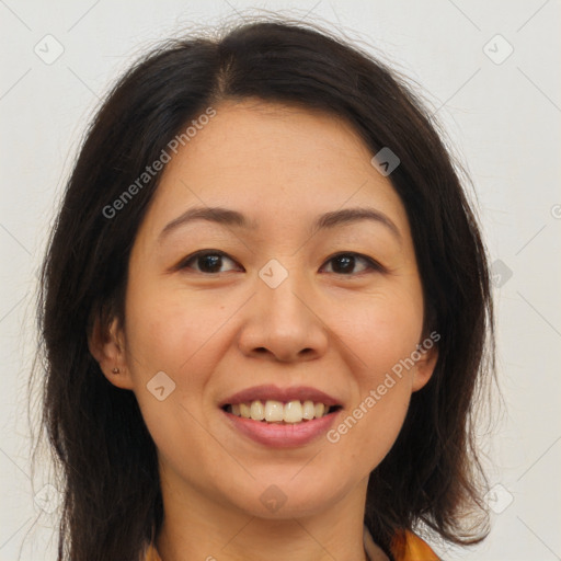 Joyful white young-adult female with long  brown hair and brown eyes