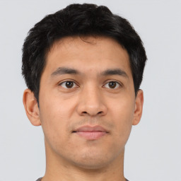 Neutral asian young-adult male with short  brown hair and brown eyes