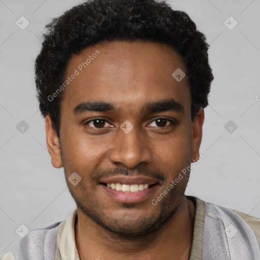 Joyful black young-adult male with short  brown hair and brown eyes