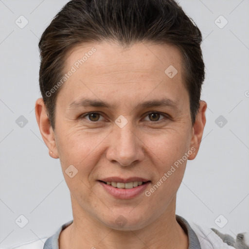 Joyful white adult male with short  brown hair and brown eyes