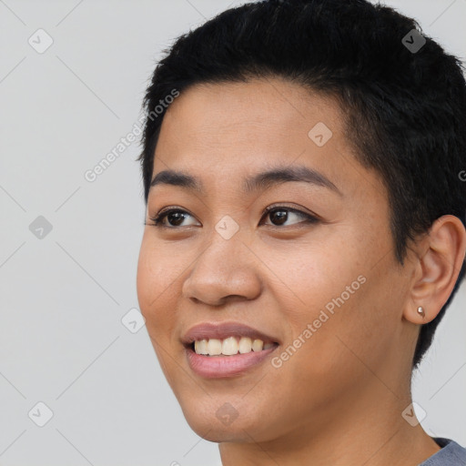 Joyful latino young-adult female with short  black hair and brown eyes