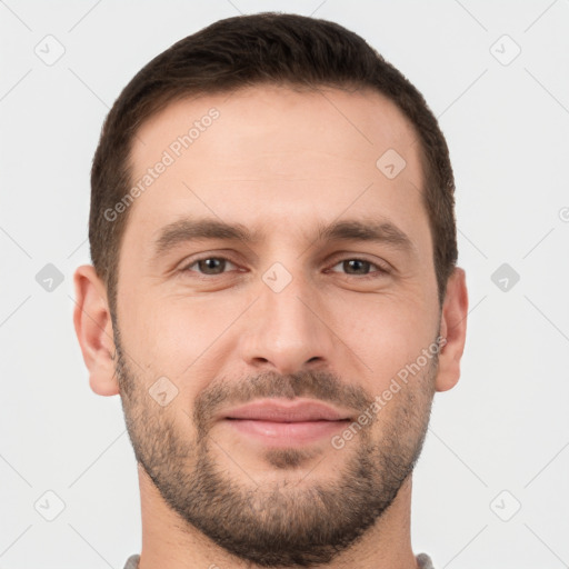 Joyful white young-adult male with short  brown hair and brown eyes