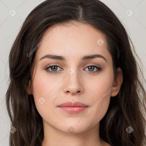 Neutral white young-adult female with long  brown hair and brown eyes