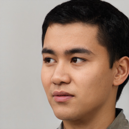 Neutral asian young-adult male with short  black hair and brown eyes