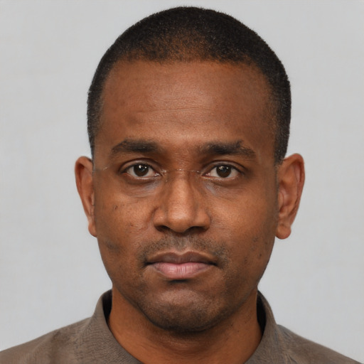 Neutral black young-adult male with short  black hair and brown eyes