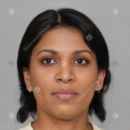 Joyful black young-adult female with medium  brown hair and brown eyes