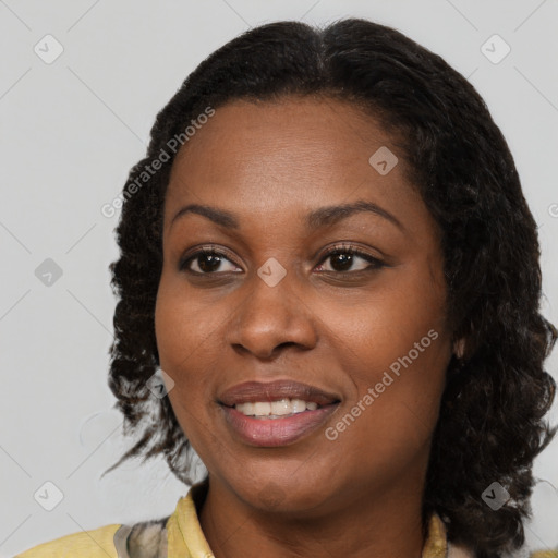 Joyful black young-adult female with medium  brown hair and brown eyes