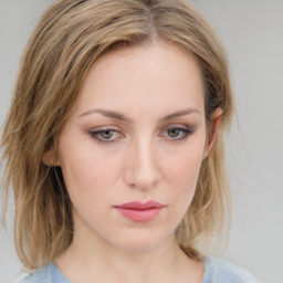 Neutral white young-adult female with medium  brown hair and blue eyes